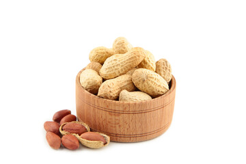 Dried peanuts in wooden bowl isolated on white background.