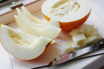 Delicious juicy melon on the table macro 