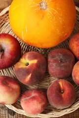Nectarines and yellow melon on the table 