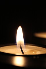 Candles produce light by releasing heat and all the turn on the candle produces come from a chemical reaction known as combustion in which wax reacts with oxygen in the air to produce carbon dioxide.