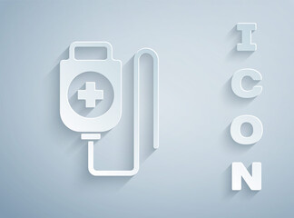Paper cut IV bag icon isolated on grey background. Blood bag. Donate blood concept. The concept of treatment and therapy, chemotherapy. Paper art style. Vector Illustration.