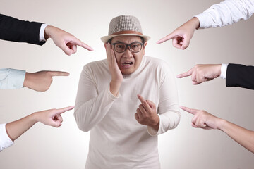 Asian Man Pointing Himself with Unhappy Expression