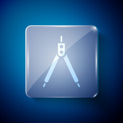 White Drawing compass icon isolated on blue background. Compasses sign. Drawing and educational tools. Geometric instrument. Square glass panels. Vector Illustration.