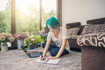 New normal Asian woman work form home, New normal social distance learning online education, Woman working on laptop computer.