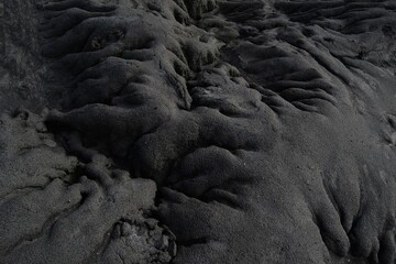 Grayscale shot of the sand under the lights - cool for wallpapers and backgrounds