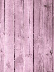 Fototapeta premium Dark pink board - vintage wooden background, vertical cracks and knots