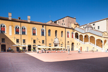 Fototapeta na wymiar Ferrara, Italy, town hall square in a summer sunny day