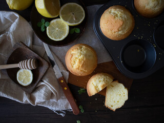 Lemon Muffins on Black Table with Copy Space. Lemon Cup Cakes Rustic Shot. Lemon Muffins Flatlay.