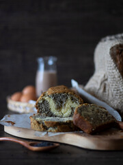 Black Sesame Marble Cake on Dark Background with Copy Space. 
