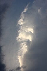 Fototapeta na wymiar multicolored storm clouds of unusual shape