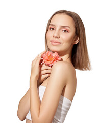 Young beautiful brunette with short hair holds a rose in her hands and smiles on a white background