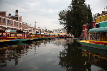 View of Xochimilco Canal with boats in the south of Mexico City, Mexico