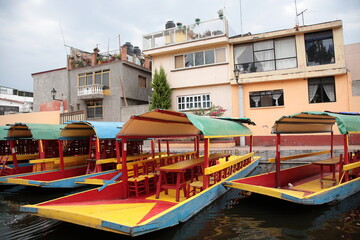 Fototapeta na wymiar View of Xochimilco Canal with boats in the south of Mexico City, Mexico