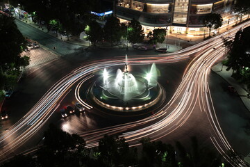 Night view of Diana the Huntress Fountain and car lights trails on promenade of the reform in Mexico city, Mexico © CYSUN