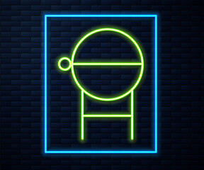 Glowing neon line Barbecue grill icon isolated on brick wall background. BBQ grill party. Vector Illustration.