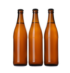 Brown bottles with beer isolated on white