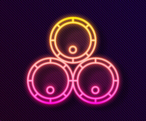 Glowing neon line Wooden barrels icon isolated on black background. Alcohol barrel, drink container, wooden keg for beer, whiskey, wine. Vector Illustration.