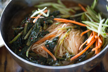 vegetarian spicy noodle with korean traditional food.