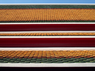perspective of three layers colorful roof tile of thai temple or grand palace