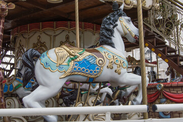 white carousel horse in carousel in Madrid. Spain