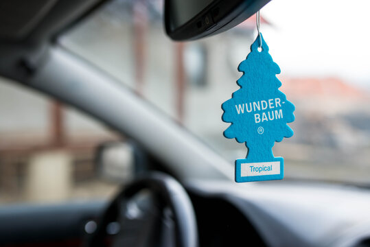 Miercurea Ciuc, Romania- 15 February 2020: Hanging Wunder Baum Tropical air freshener on car interior.

