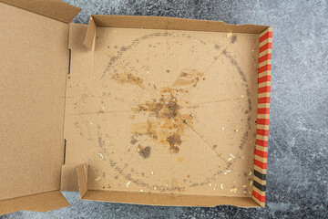 empty pizza delivery box on kitchen counter or table