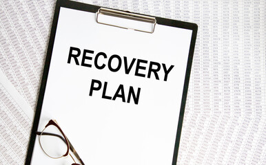 Recovery Plan word written on paper. Business concept.