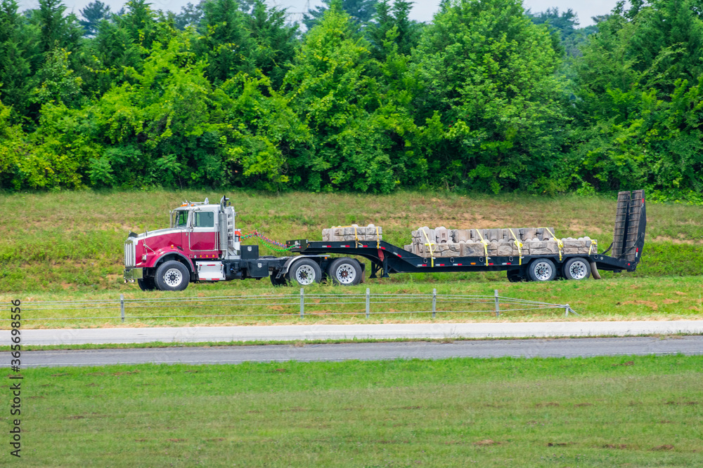 Wall mural Flatbed 18-Wheeler Carrying Load of Stone For Construction