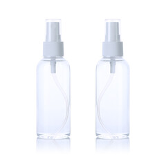 Blank transparent spray bottle filled with water for mock up, isolated on white background. Front & back view. Clear hand sanitiser for template. Empty misquoter repellent for branding. Studio Shot