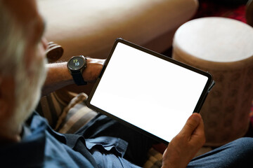 old man white hair with smart watch using pro tablet