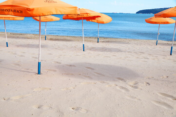 Varna, Bulgaria - July, 13, 2020: beach umbrellas on an empty beach