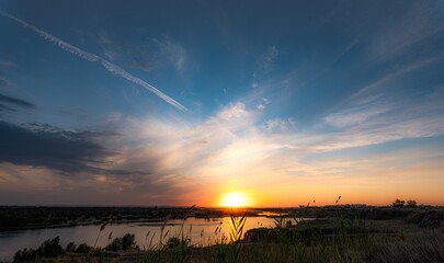 
July sunset over the Volga-Akhtubinskaya floodplain near the city of Volzhsky. Russia