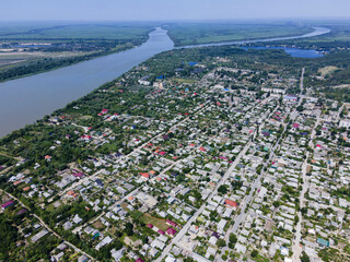 Aerial view on Vilkovo city (Ukrainian Venice, city built on water) on backgrund is Ermakov island