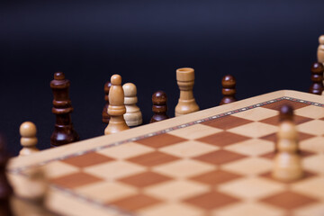 Chess, the pieces that are out of the game are outside the chessboard.