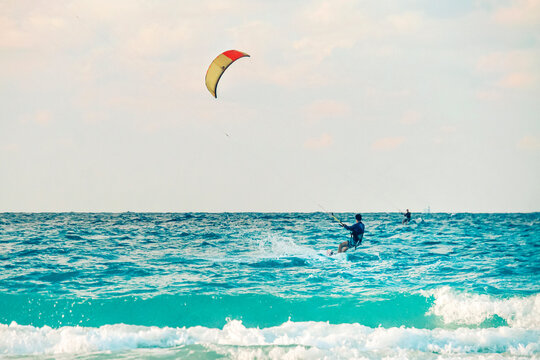 kiteboarder kitesurfer athlete performing kitesurfing kiteboarding tricks unhoocked