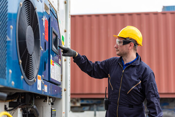 Engineer checking and setting temperature cooling units in freight of cargo logistic transport. - 365709592