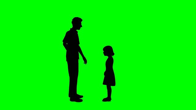 Adult male talking to child on green screen