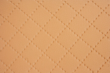 Natural orange leather texture. Material pattern. Empty copy space. Luxury fashion background.