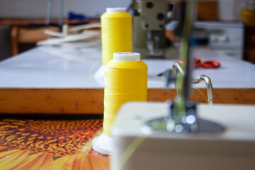 sewing machine foot and needle. Close up, macro. Empty space for text. Craft fabric industrial.