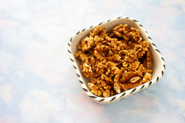 Walnut on wooden table. Diet food, vegetarian and delicious