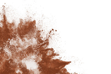 Naklejka na ściany i meble Brown color powder explosion on white background. Colored cloud. Colorful dust explode. Paint Holi.