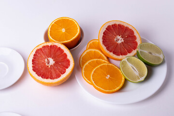 Fototapeta na wymiar freah juicy citruses cut in slices