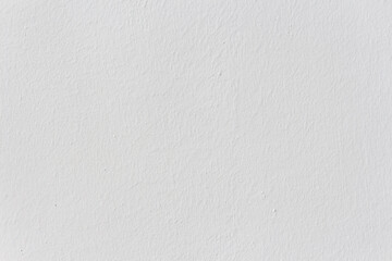 Abstract white color painted cement wall texture background. Copy space for your text and decorations.