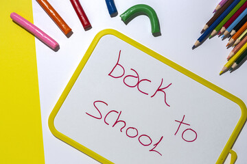 Back to school supplies, notebooks, colored pencils