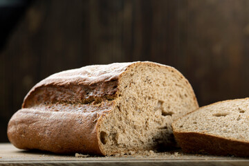 Sliced fresh bread on table close-up.