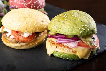 Set of multi-colored delicious hamburgers.