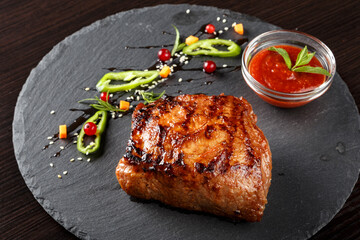 Steak on slate blackboard