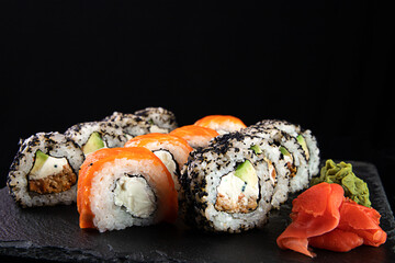 Sushi roll sushi with prawn, avocado, cream cheese, sesame. Sushi menu. Japanese food