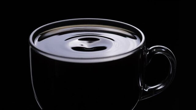Coffee Drop Into The Filled Cup