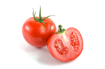 Whole Fresh tomato and half tomatoes on white background.
